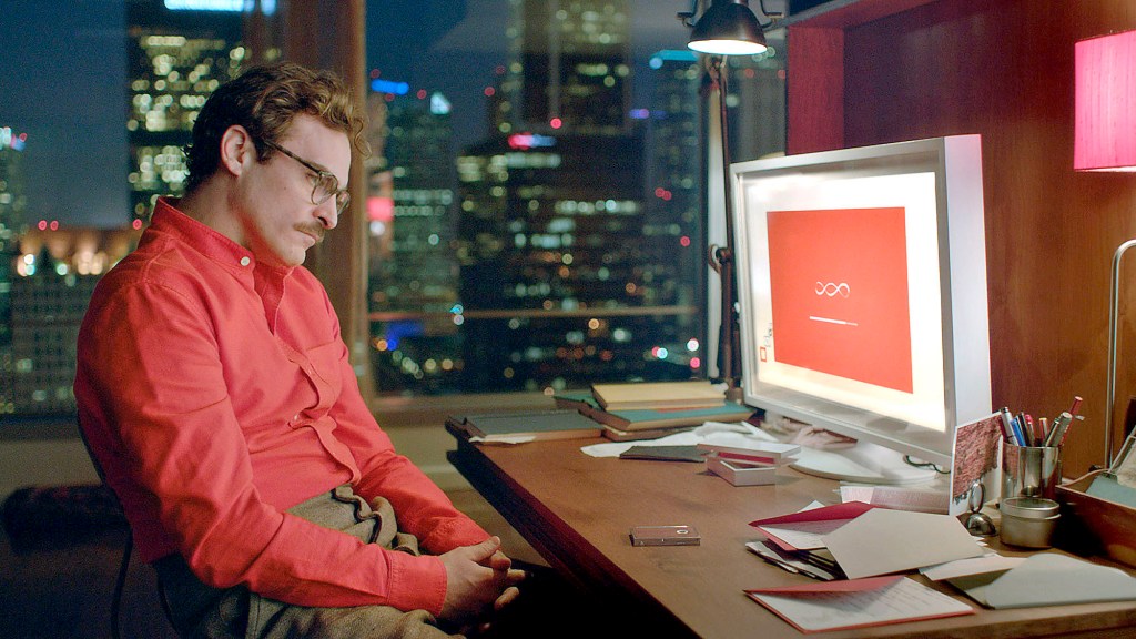 Joaquin Phoenix al frente de su computadora en Her.