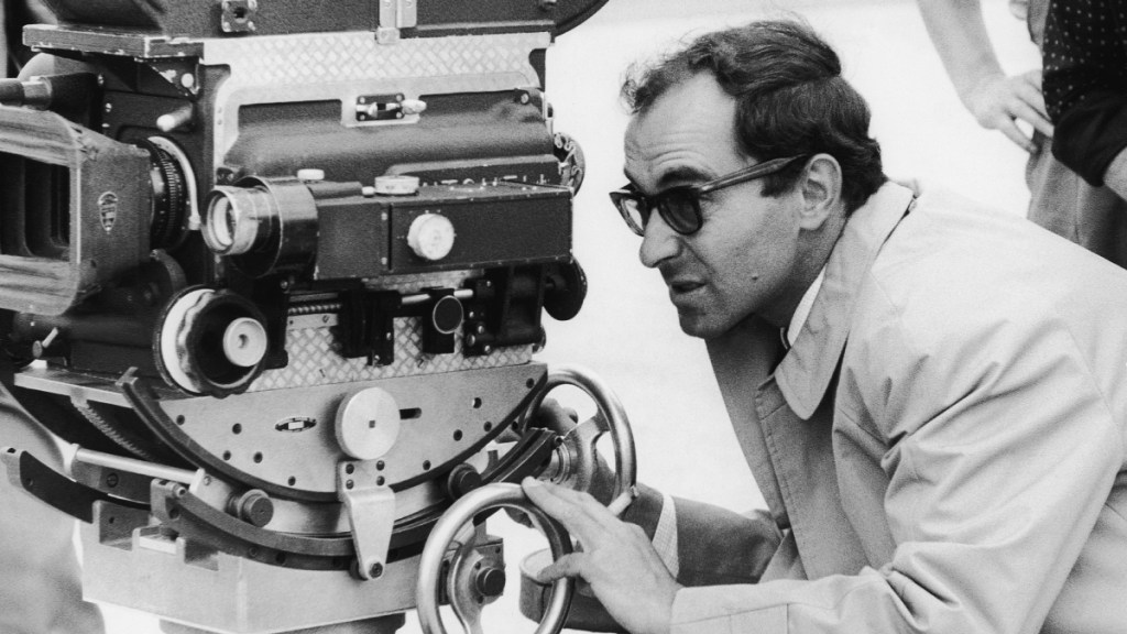Jean-Luc Godard dirigiendo una película. 