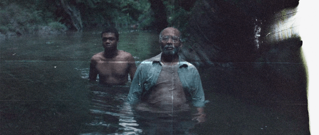 Fotograma de la selva colombiana en la película Yo vi tres luces negras con diseño editorial de Toma 20.